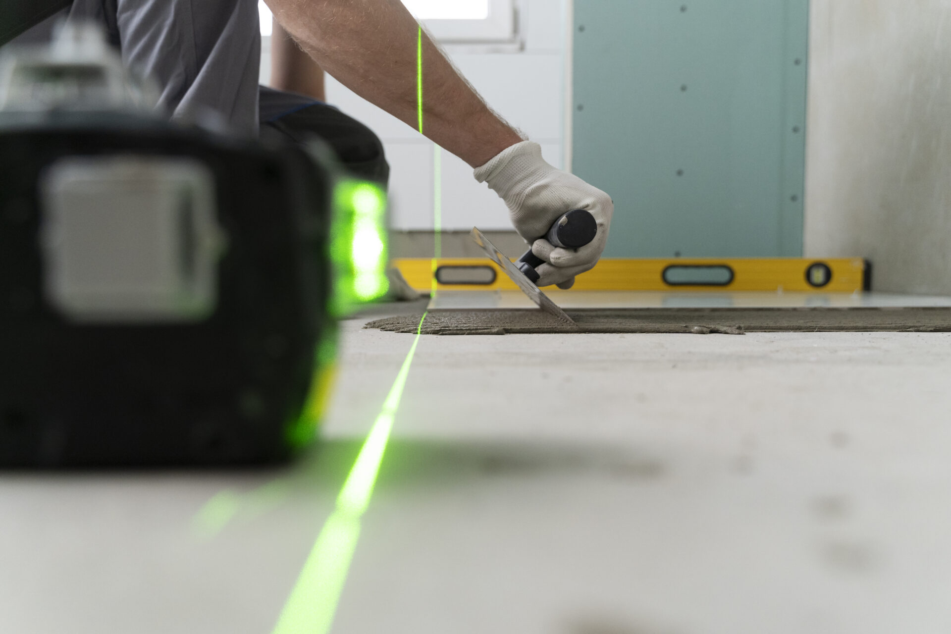 tiler-working-renovation-apartment